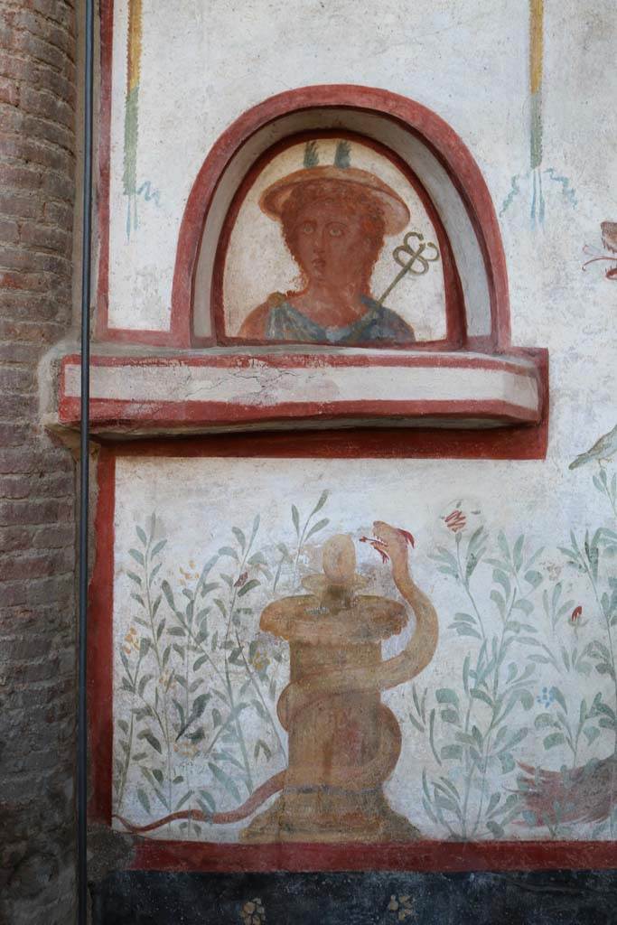 I.6.2 Pompeii. October 2023. 
Detail from south end of lararium on west wall. Photo courtesy of Johannes Eber.
