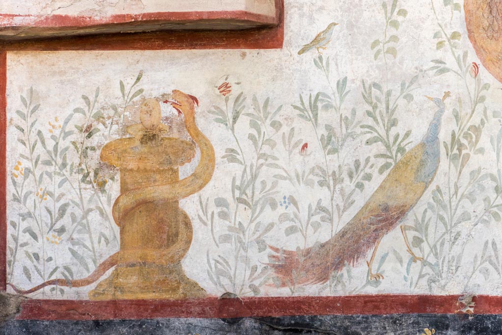 I.6.2 Pompeii. September 2019. Painted altar with small serpent, at the south end of the painted lararium beneath Mercury.
Photo courtesy of Klaus Heese.
