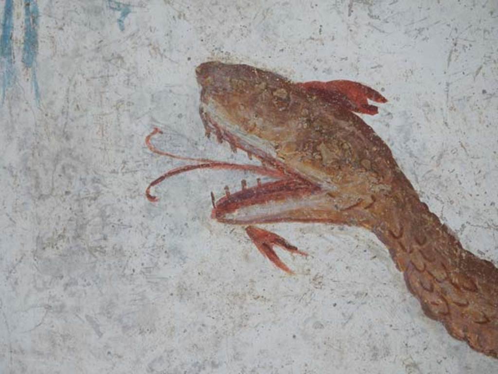 I.6.2 Pompeii. May 2017. Detail of painted serpent at north end of painted lararium. Photo courtesy of Buzz Ferebee. 