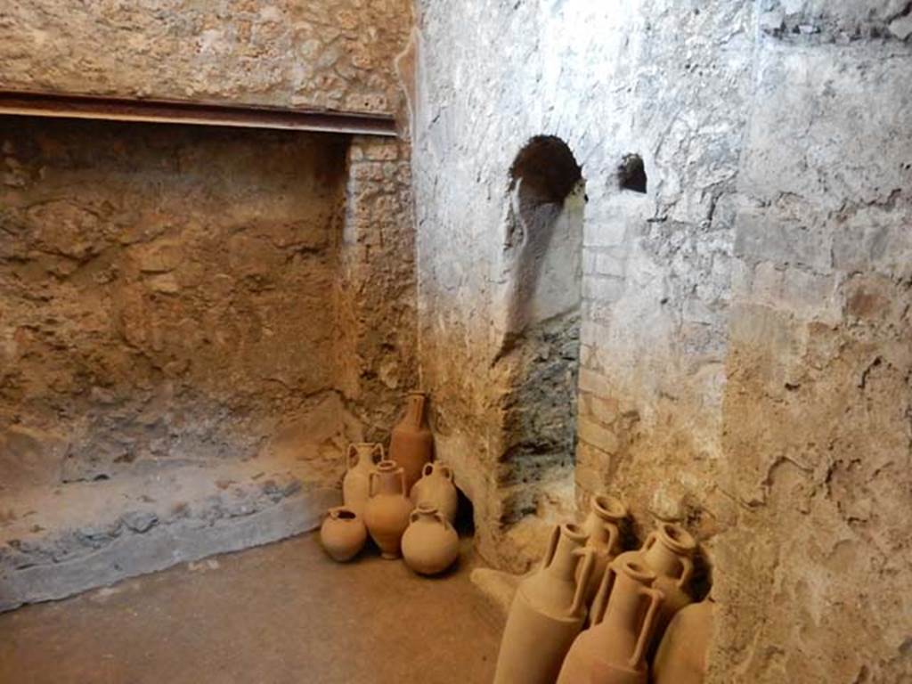 I.6.2 Pompeii. May 2016. South wall of room in north-east corner, with doorway to baths area.  Photo courtesy of Buzz Ferebee.
