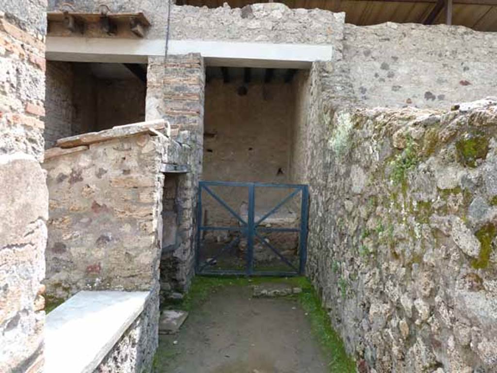 I.6.7 Pompeii. May 2010. Looking south towards west end of kitchen.