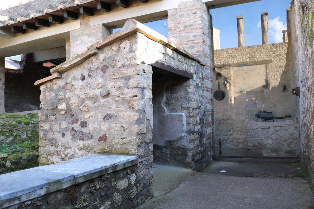 I.6.7 Pompeii. December 2018. Looking south to small, covered area and west end of kitchen. Photo courtesy of Aude Durand.