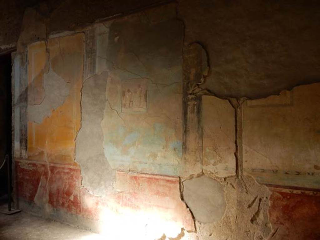 I.6.11 Pompeii. May 2015. North end of west wall, with doorway to cubiculum 4, on left. Photo courtesy of Buzz Ferebee.

