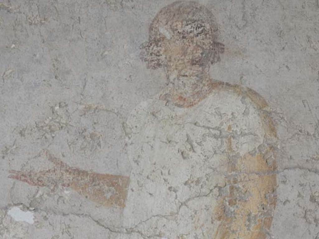 I.6.11 Pompeii. May 2015. Detail of figure from wall painting from north end of west wall. Photo courtesy of Buzz Ferebee.
