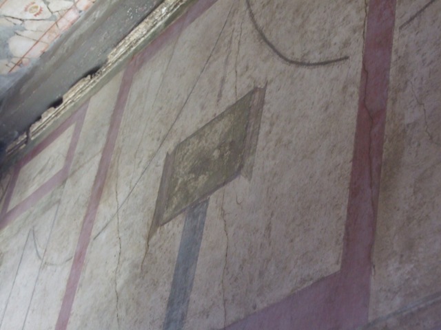 I.6.15 Pompeii.  December 2007. Entrance corridor.  Painted plaster panel on west wall.