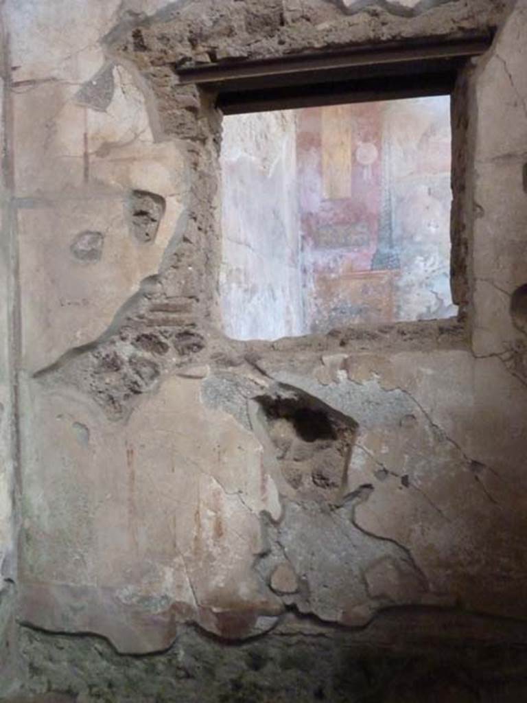 I.6.15 Pompeii. September 2015. Room 8, north wall with window.