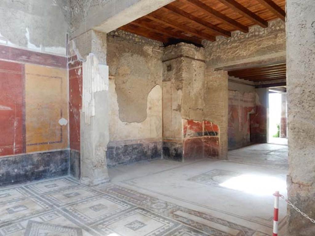 I.7.1 Pompeii. May 2016. Looking south-east across atrium towards east wall of tablinum, with recess. Photo courtesy of Buzz Ferebee.
