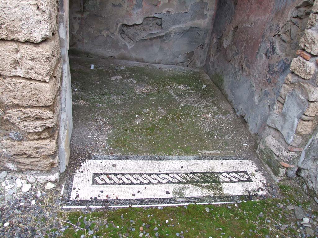 I.7.7 Pompeii. December 2006. Eastern ala with mosaic threshold, looking east.