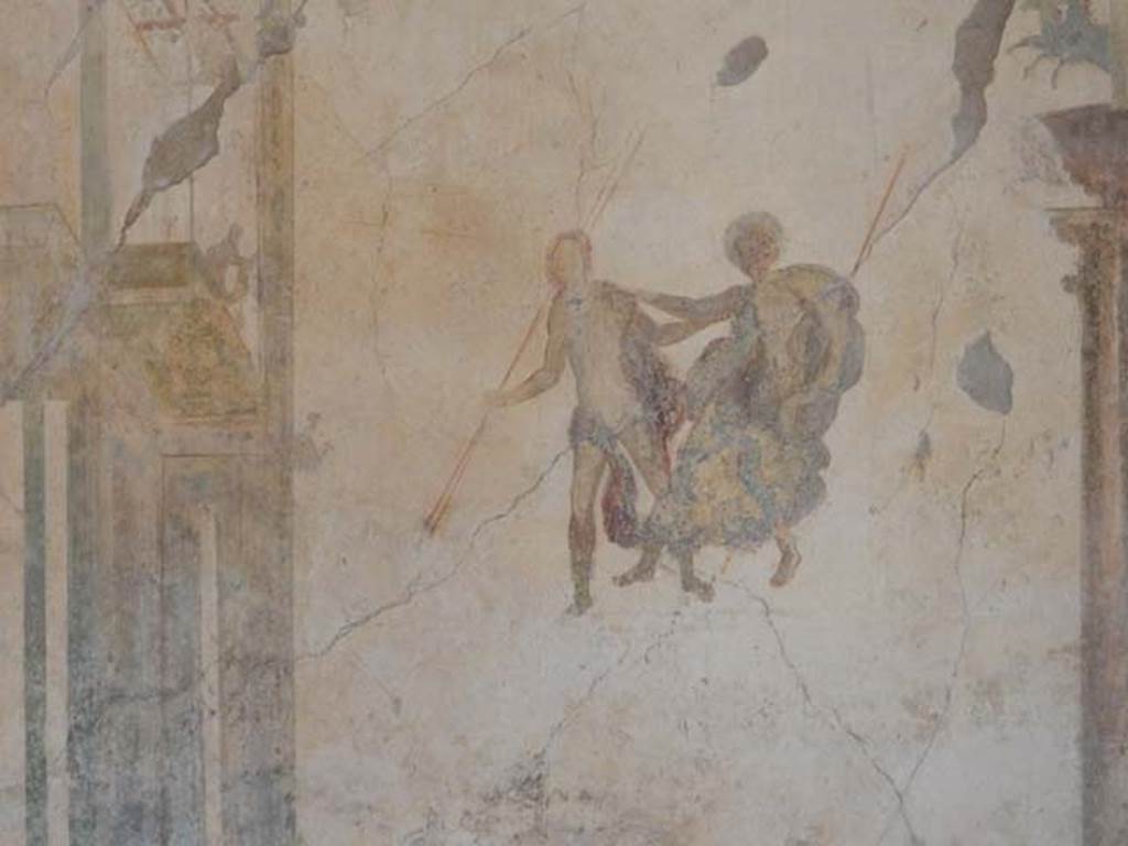 I.7.11 Pompeii. September 2021. 
Detail of painted decoration from centre of panel at west end of north wall. Photo courtesy of Klaus Heese.
