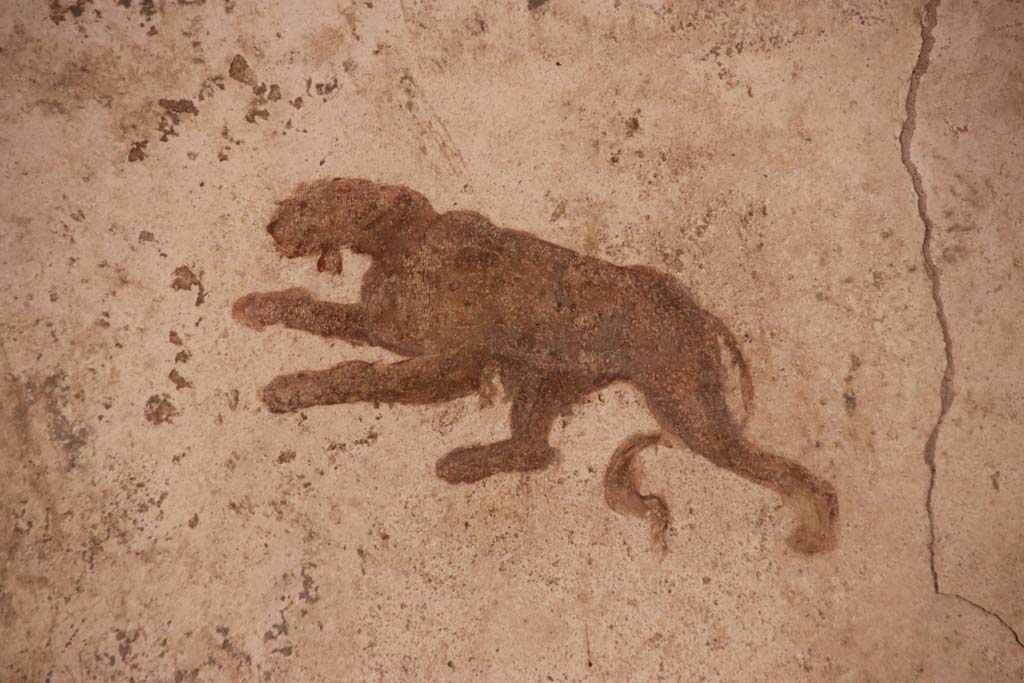 I.7.11 Pompeii. September 2021. East wall of exedra, detail from centre of panel on south side. Photo courtesy of Klaus Heese.