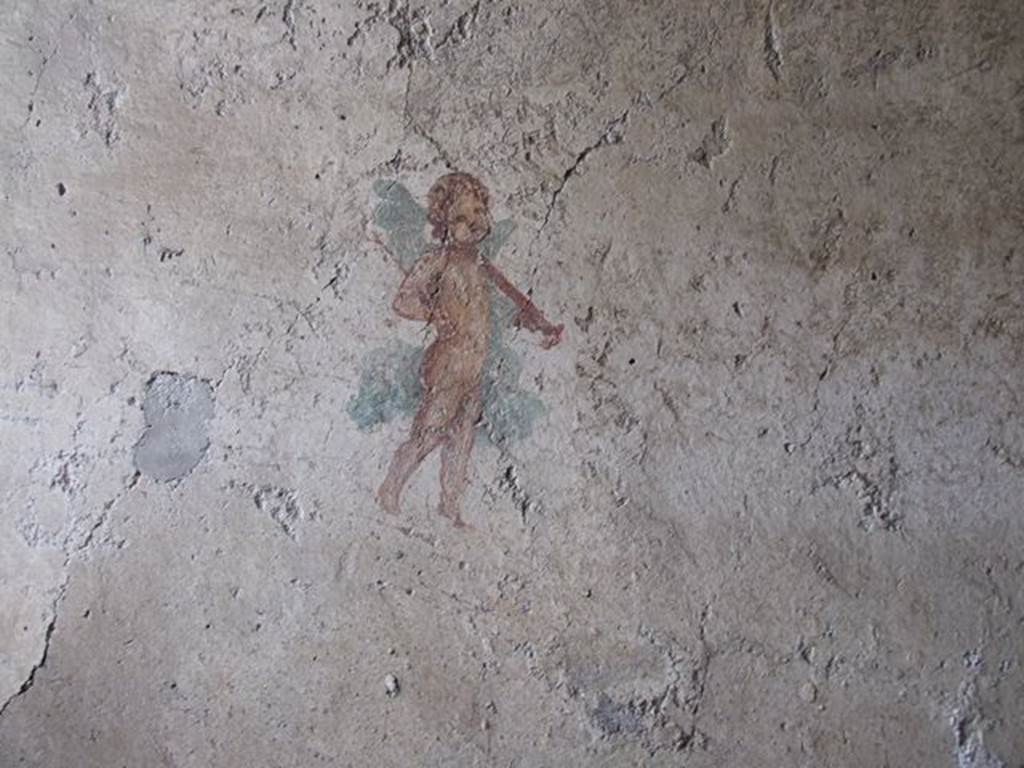 I.7.11 Pompeii. 2017/2018/2019.
Wall painting of cupid with sword from south wall of bedroom. Photo courtesy of Giuseppe Ciaramella.
