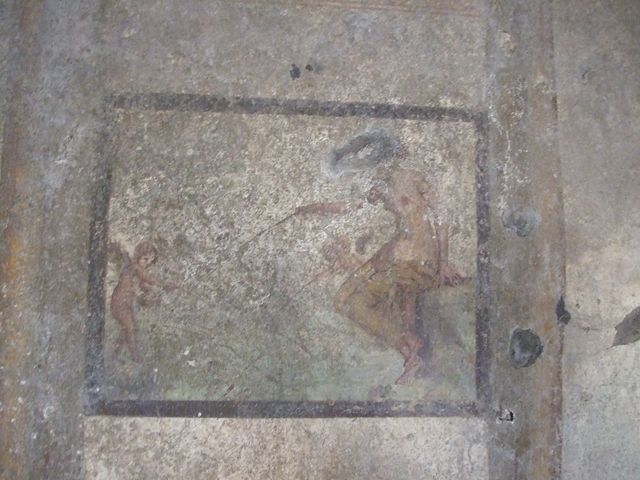 .7.11 Pompeii. December 2006.  Wall painting of flying cupid from north end of west wall of bedroom on west side of atrium.
