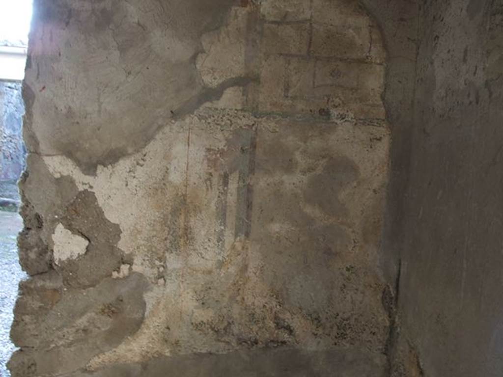 I.7.11 Pompeii. December 2006. Painted decoration in north-west corner of cubiculum on north side of blocked entrance I.7.10.