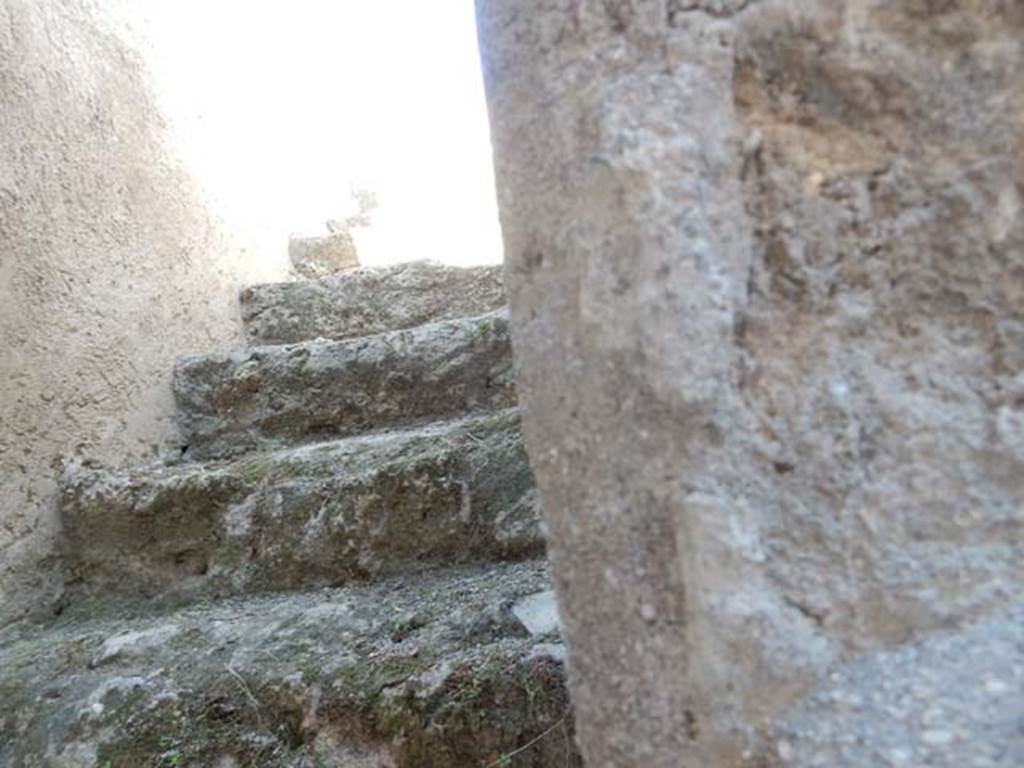 I.7.11 Pompeii. May 2017. Stairs to the upper floor, on the north wall in I.7.10. Photo courtesy of Buzz Ferebee.
