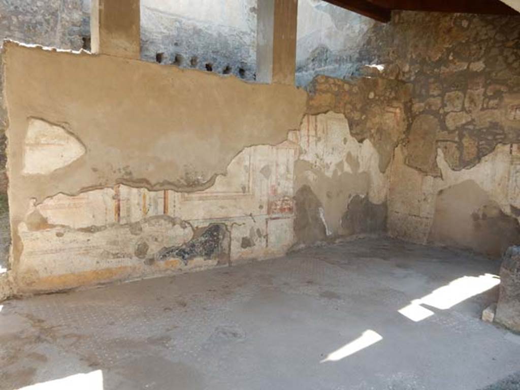 I.7.11 Pompeii. May 2017.  Looking towards the north-west corner and west wall of tablinum on west side of atrium in I.7.10. Photo courtesy of Buzz Ferebee.
