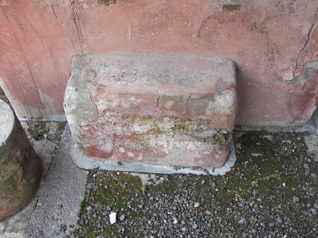 I.7.12 Pompeii. December 2006. Small altar below wall painting on west wall opposite the entrance.