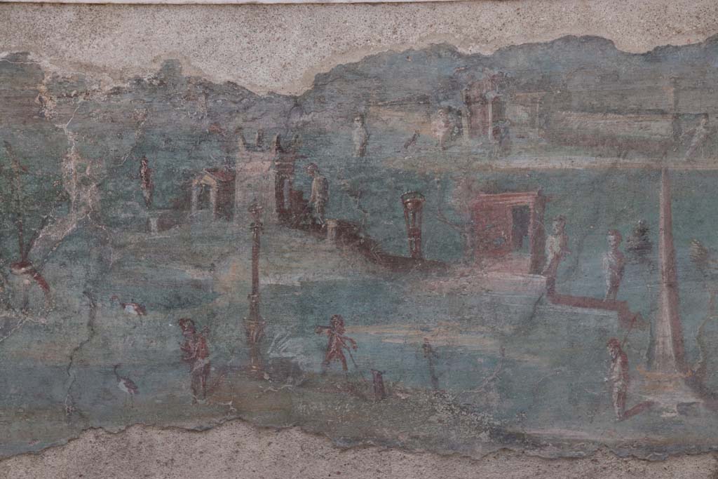 I.7.12 Pompeii. September 2021. Painted panel on inside of west side of summer triclinium. Photo courtesy of Klaus Heese.