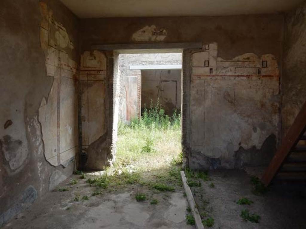 I.7.18 Pompeii. May 2017. Looking east from entrance, across atrium to tablinum. Photo courtesy of Buzz Ferebee.
