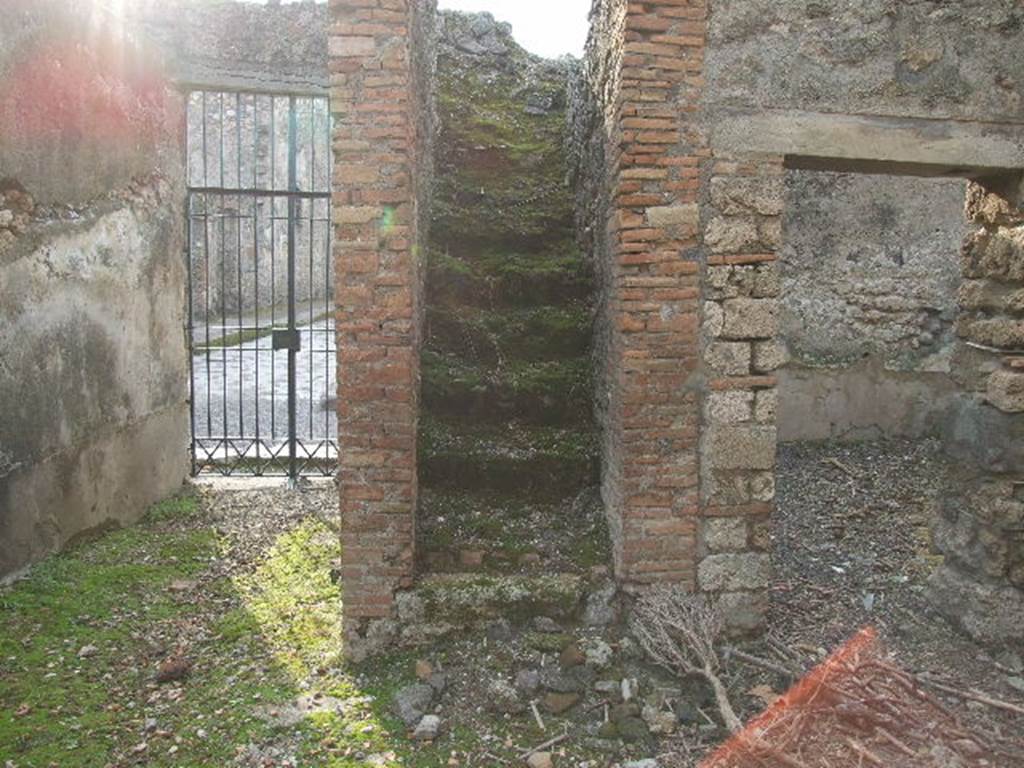 I.7.19 Pompeii. December 2006. Stairs to upper level on west side of atrium, near entrance corridor.