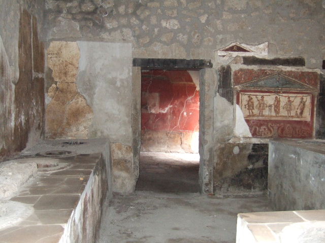 I.8.8 Pompeii. October 2017. 
Looking towards rear wall of bar room with doorway to rear room, on left, doorway to oecus, atrium and dwelling, on right.
Foto Taylor Lauritsen, ERC Grant 681269 DÉCOR.

