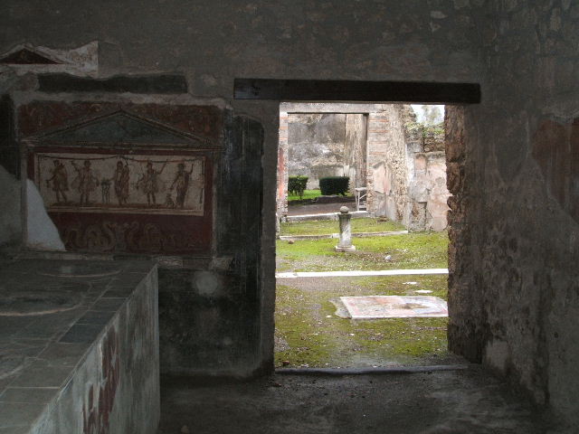 I.8.8 Pompeii. December 2018. Looking south along western side of bar-counter. Photo courtesy of Aude Durand.