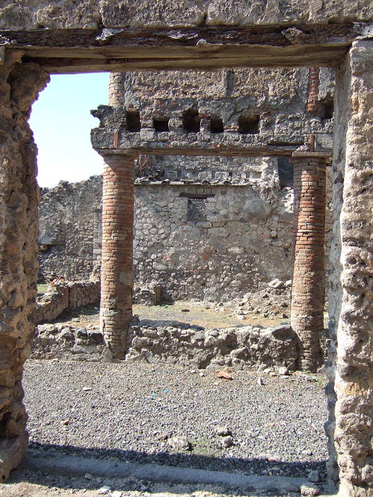 I.8.10 Pompeii. October 2022. Looking west from entrance doorway, into peristyle area 1. Photo courtesy of Klaus Heese. 

