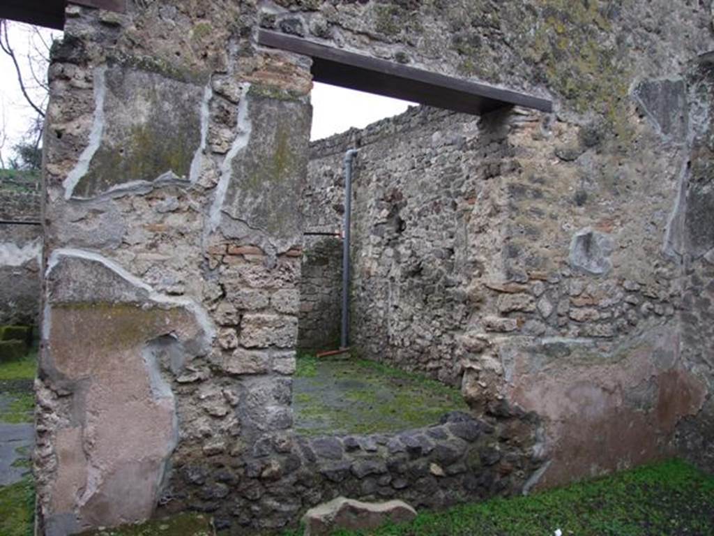 I.8.14 Pompeii. December 2007. Room 6, west wall of garden area, with remains of a high cocciopesto zoccolo, and white upper zone of walls.
