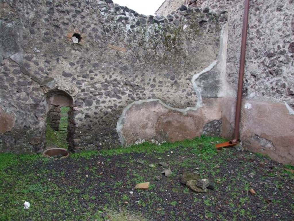 I.8.14 Pompeii. December 2007.  Looking through hole in wall to back rooms of I.8.15/16.
