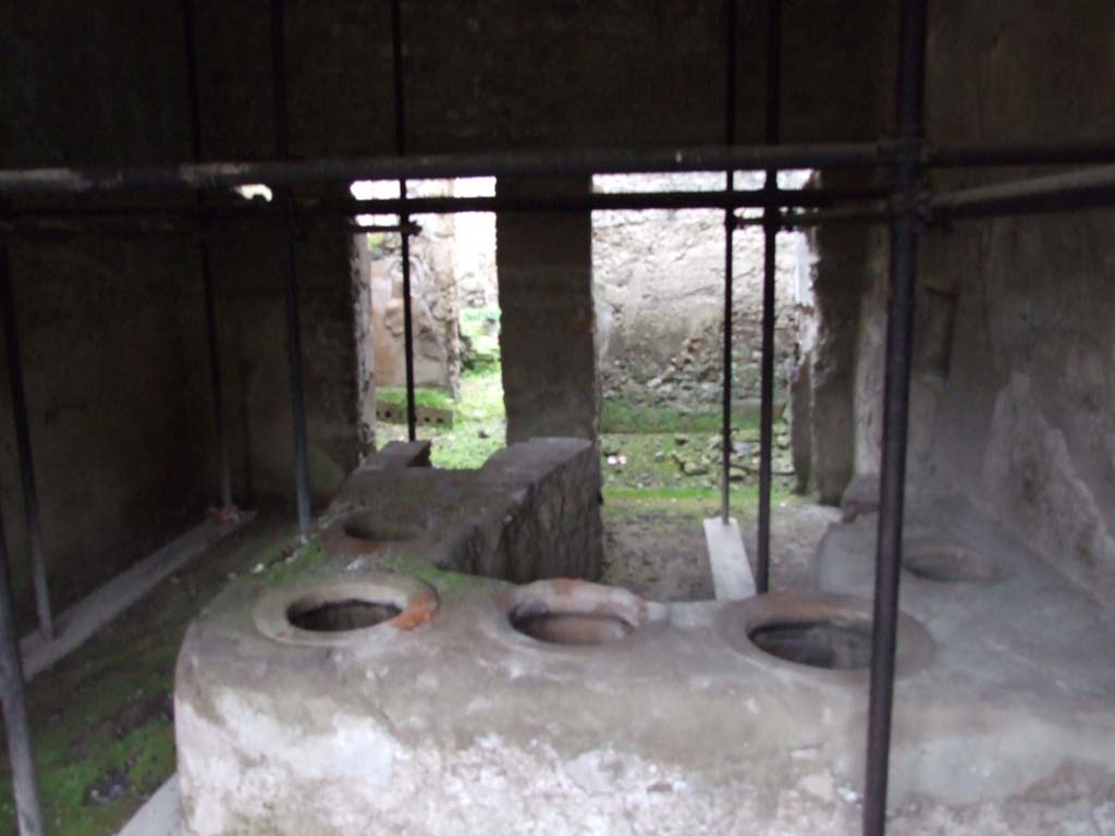 I.8.15 Pompeii. July 2021. Looking north across counter towards doorways to two rear rooms.
Foto Annette Haug, ERC Grant 681269 DÉCOR.

