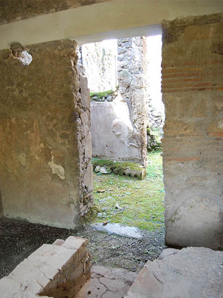 I.8.15 Pompeii. July 2021. Looking north-east across podium in shop-room, and two rear rooms on its north side.
Foto Annette Haug, ERC Grant 681269 DÉCOR.

