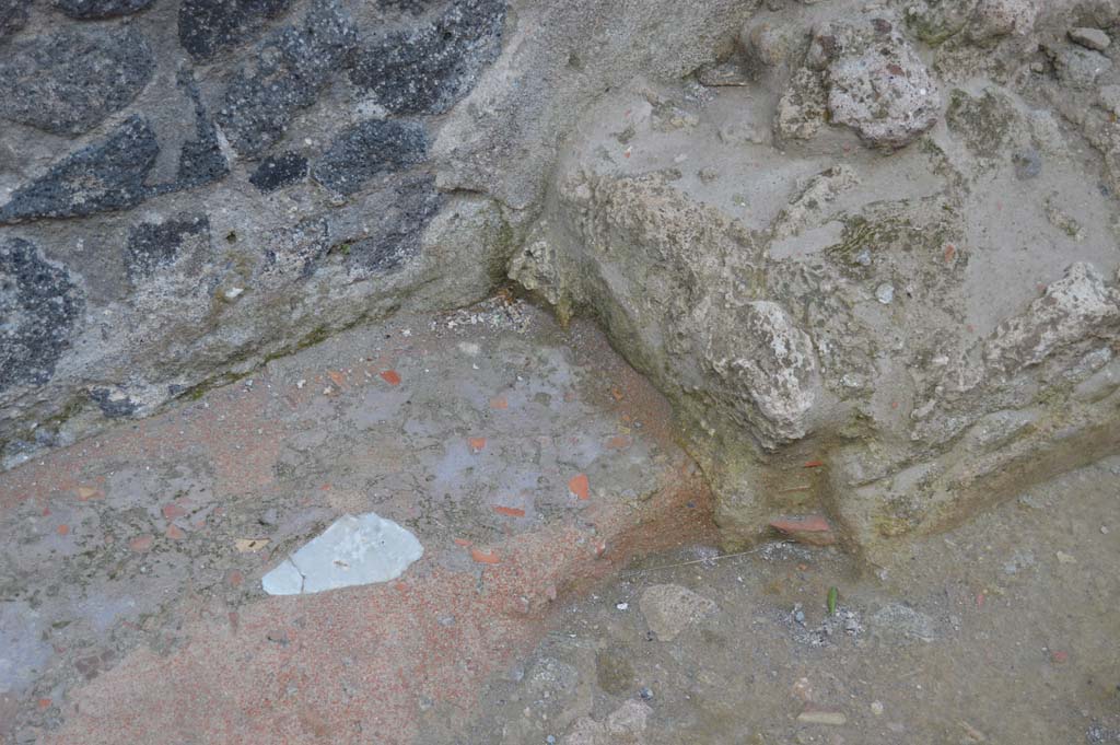 I.8.17 Pompeii. March 2019. Detail of pavement at north end of bench outside of doorway.
Foto Taylor Lauritsen, ERC Grant 681269 DCOR.
