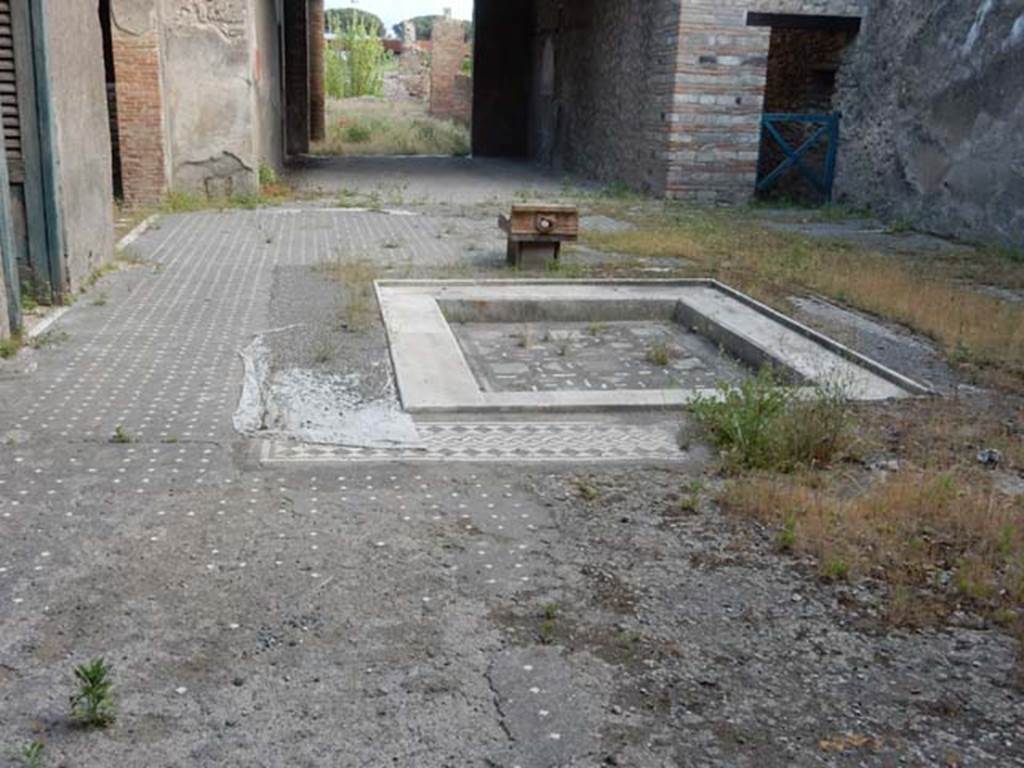 I.9.1 Pompeii. May 2017. Room 2, looking south across impluvium in atrium.  Photo courtesy of Buzz Ferebee.
