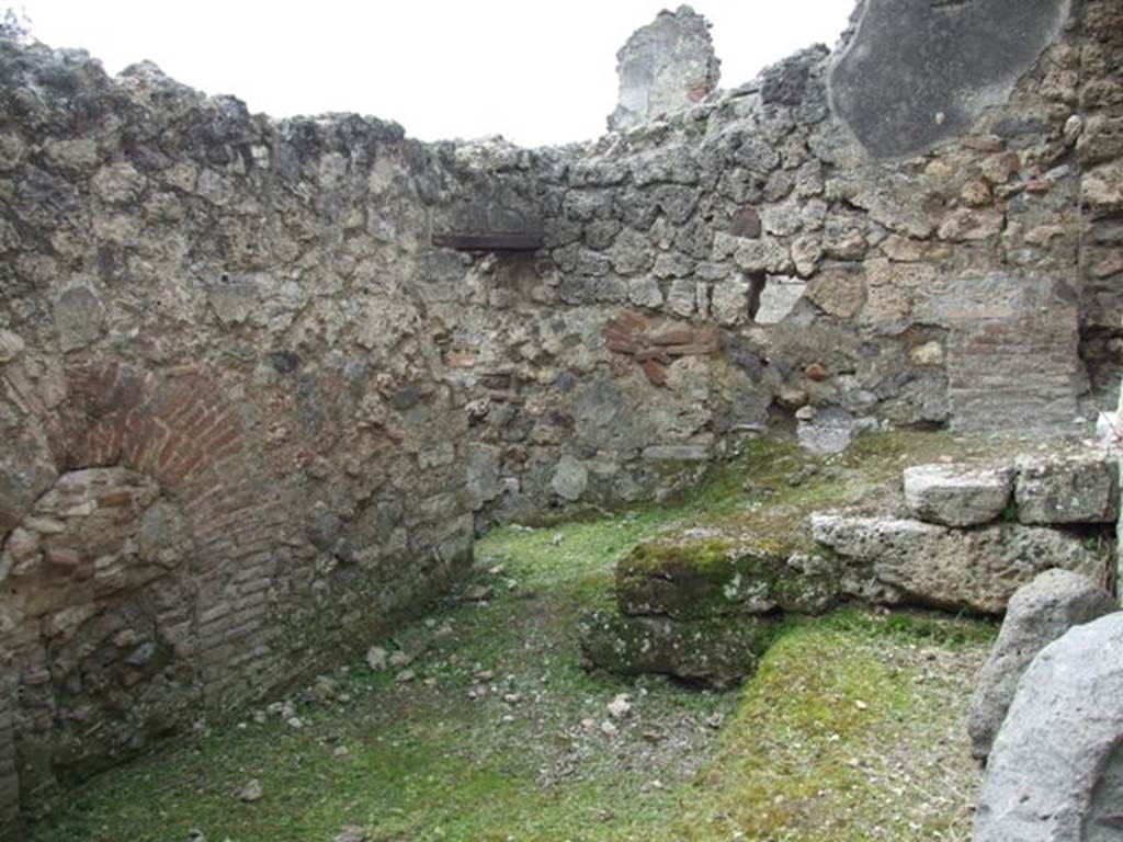 I.9.3 Pompeii. March 2009. Room 7, looking west to stairs against west wall, and doorway to room 9.