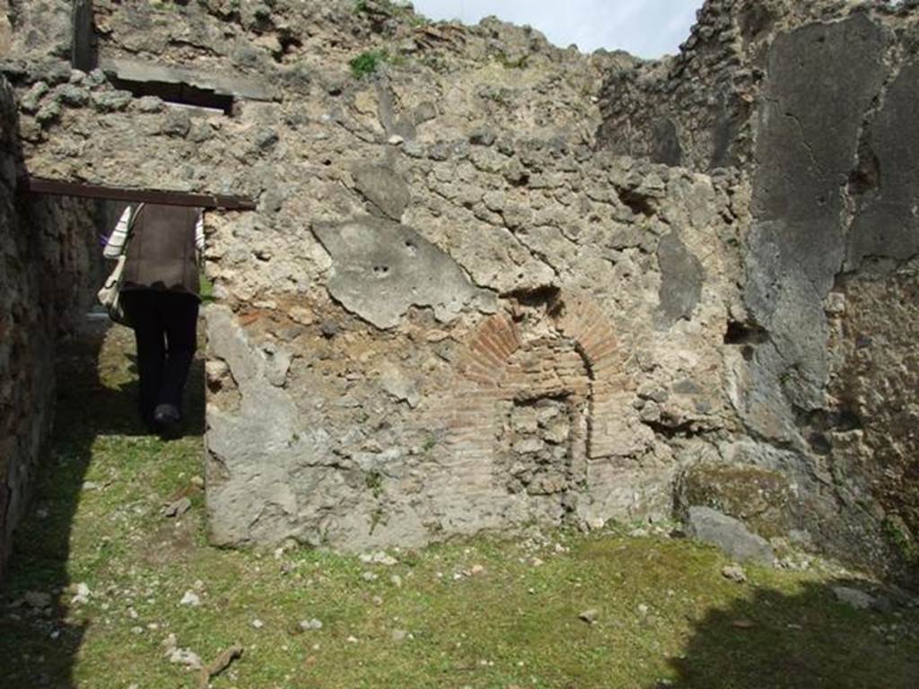 I.9.3 Pompeii. March 2009. Room 9. North wall with door to room 7.