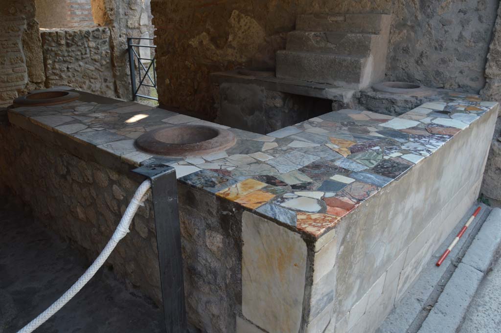 I.9.4 Pompeii. October 2017. Looking south-west across podium/counter, and threshold.
Foto Taylor Lauritsen, ERC Grant 681269 DÉCOR.



