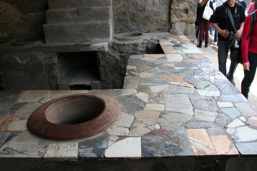 I.9.4 Pompeii. April 2013. Top of marble counter, looking west. Photo courtesy of Klaus Heese.