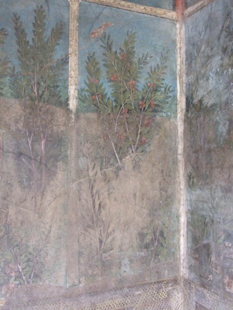 I.9.5 Pompeii. April 2022. Room 5, cubiculum. South end of east wall. 
Detail of painting of Egyptian pharaonic statue and cherry tree.
Photo courtesy of Johannes Eber.

