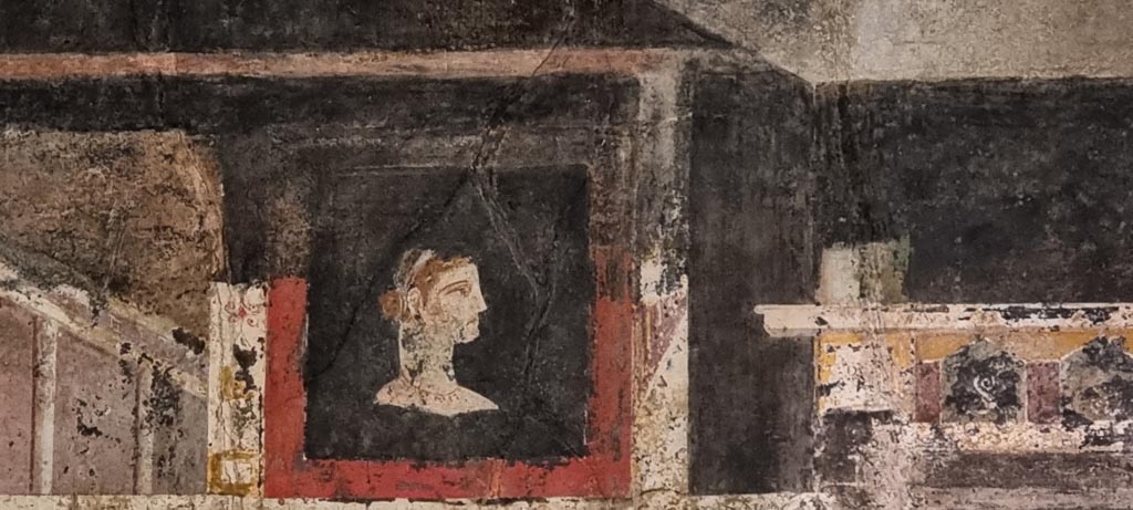 I.9.5 Pompeii. April 2022. 
Room 10, west wall of triclinium. Painting of Acteon and Artemis, or Diana. 
Photo courtesy of Johannes Eber.
