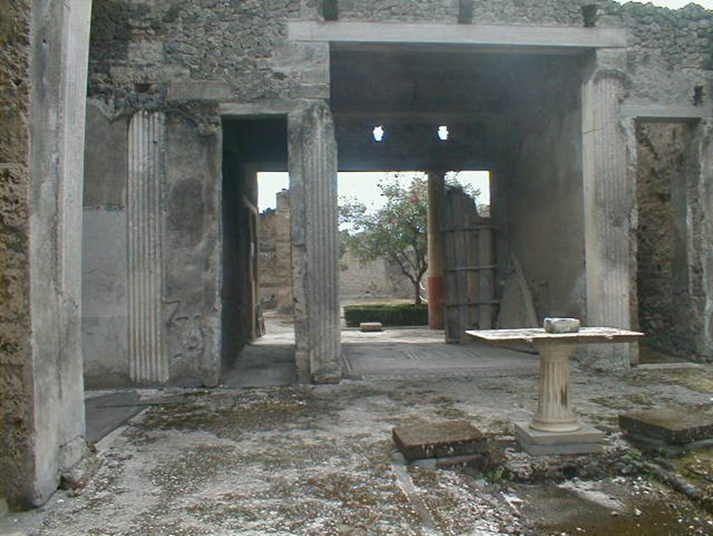 I.9.5 Pompeii. May 2015. Room 3, looking south across atrium towards tablinum, and the rear. Photo courtesy of Buzz Ferebee.
