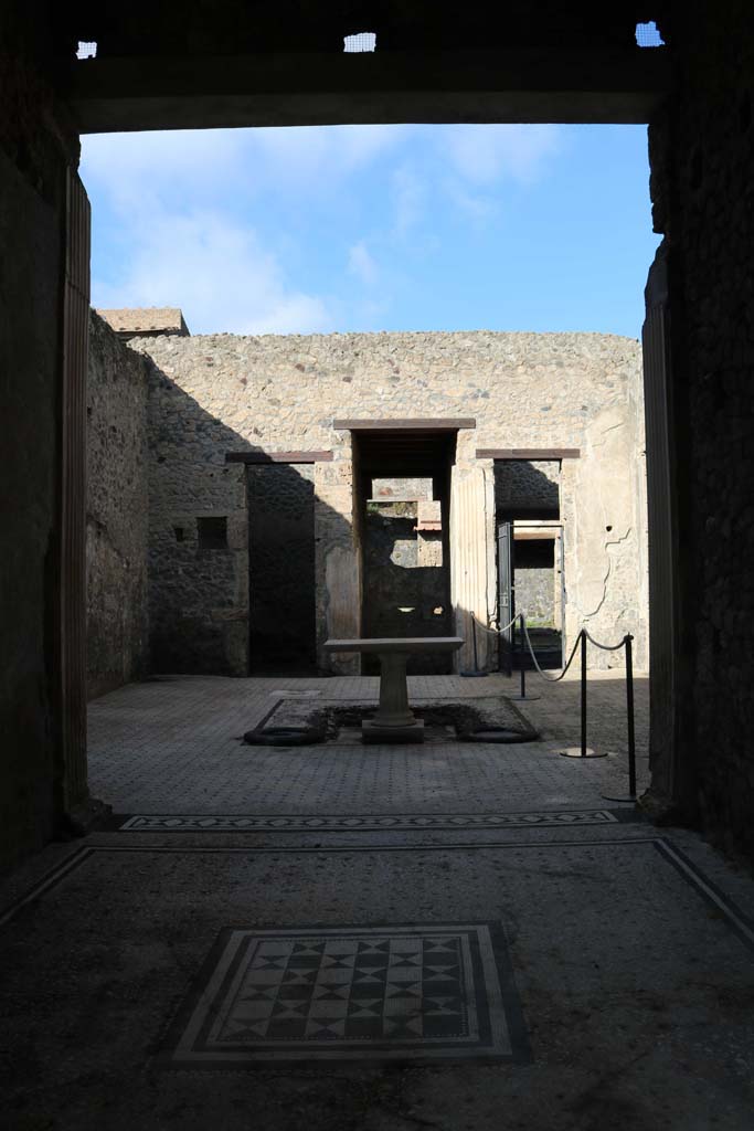 I.9.5 Pompeii. May 2017. Room 8, looking north from tablinum across atrium towards doorways to rooms on either side of entrance corridor. Photo courtesy of Buzz Ferebee.
