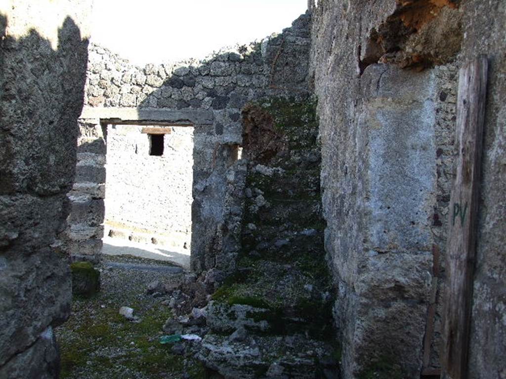 I.9.9  Pompeii. December 2006. Looking east in entrance fauces, to stairs to upper floor and entrance.