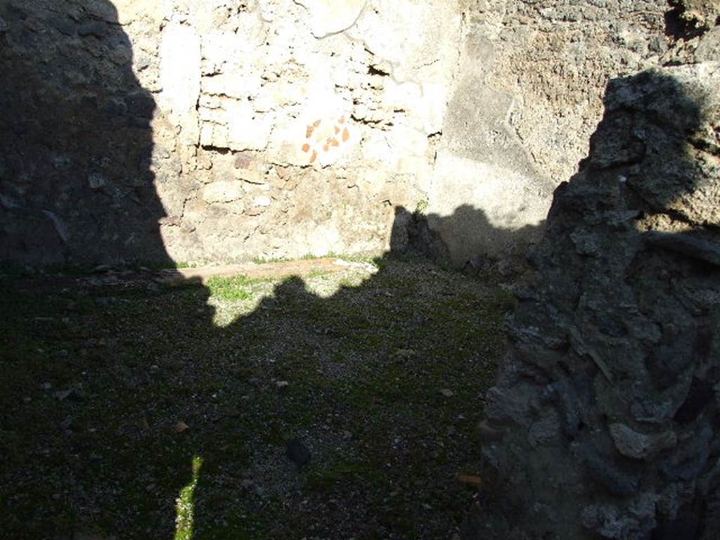 I.9.9 Pompeii. December 2006. Room on north side of corridor, possibly an oecus or workshop?.