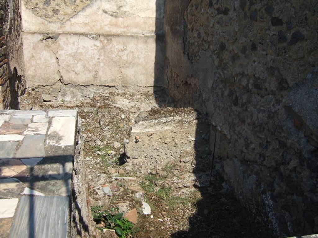 I.9.11 Pompeii.  September 2005.  Rear east room behind counter.