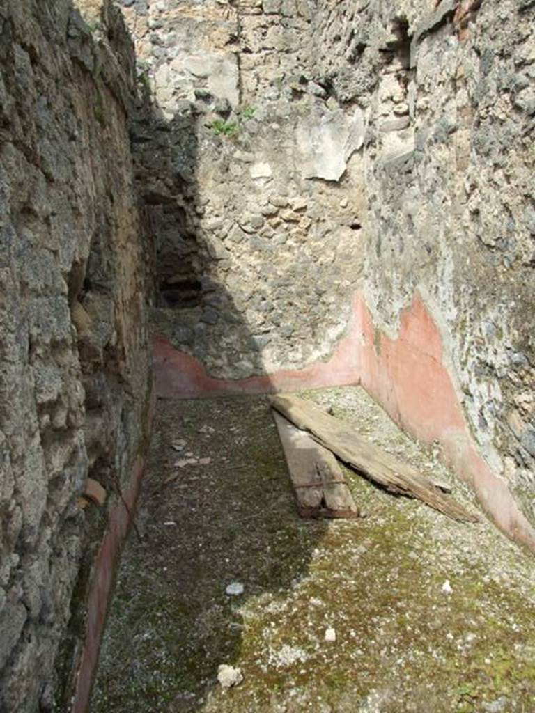 I.9.12 Pompeii. March 2009.  Room 9.  North side of room with remains of plaster .