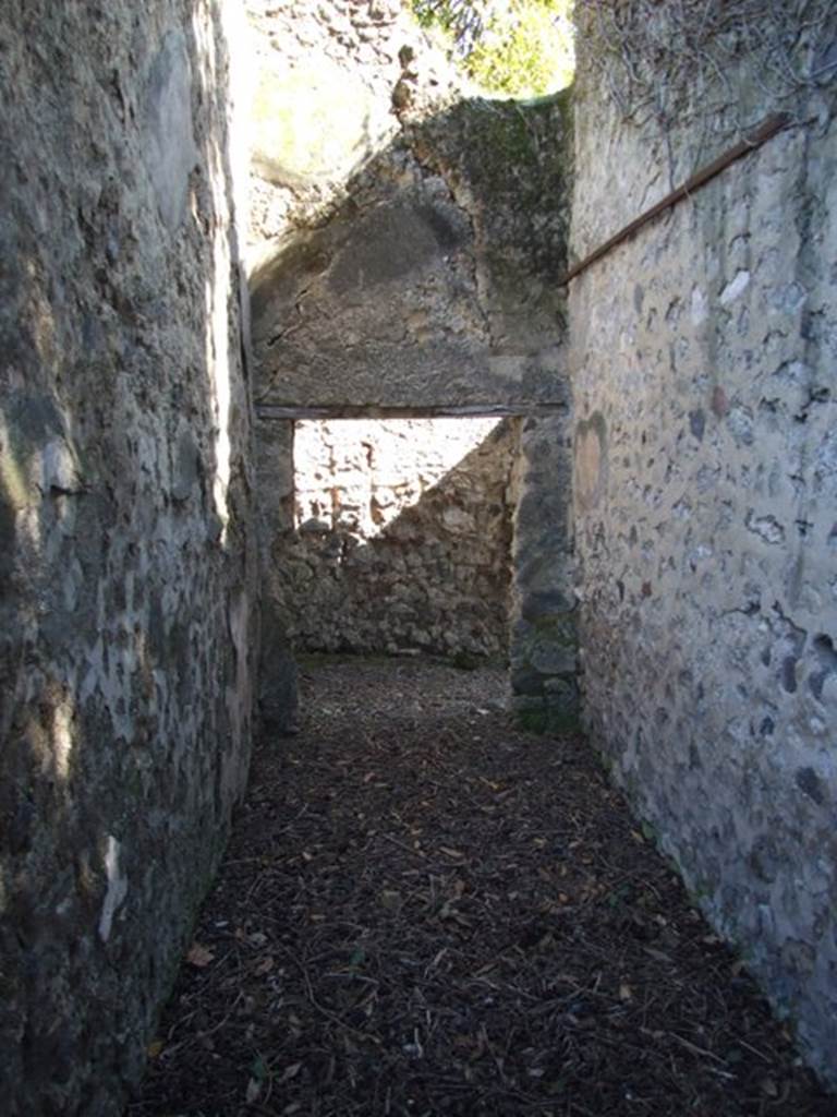 I.10.4 Pompeii. March 2009. Corridor M1 looking east from kitchen doorway.