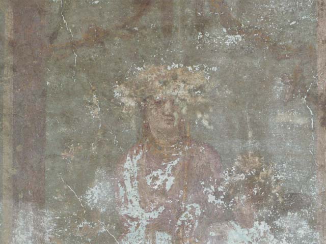 I.10.4 Pompeii. December 2018. 
Alcove 24, detail of painted plaster of Venus and cherubs in temple. Photo courtesy of Aude Durand.
