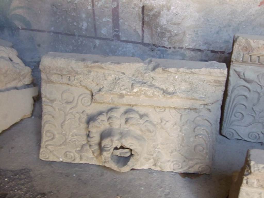 I.10.7 Pompeii. March 2009.   Room 3.    Cubiculum. Remains of a Lion. Grondaia or antefisse fittili  (rainwater spouts for gutters).