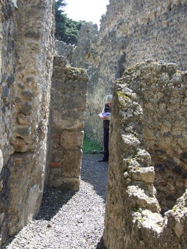 I.10.8 Pompeii.  March 2009.  Room 7. Corridor to rear and kitchen.