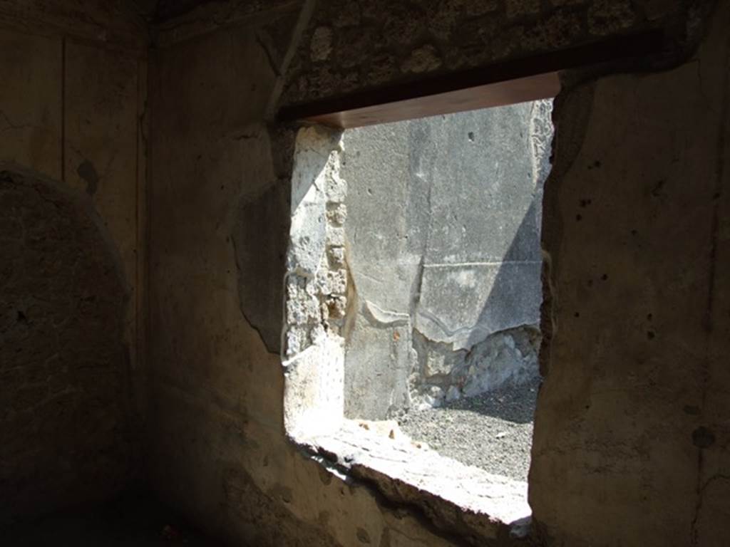 I.10.8 Pompeii. March 2009. Room 3, south-east corner and south wall of cubiculum, with window to room 4.