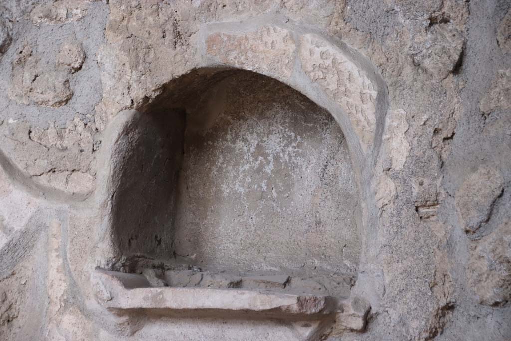 I.10.16 Pompeii. September 2021. Detail of niche in west wall of atrium. Photo courtesy of Klaus Heese.